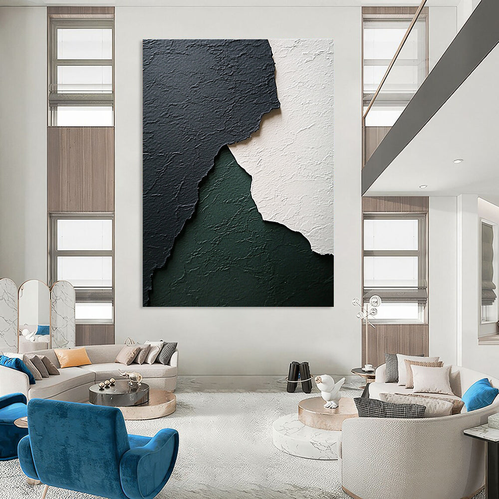 Abstract art featuring textured black white and green paper with subtle gray and emerald tones and a wave-like shape enhancing its worn appearance.STSC1281