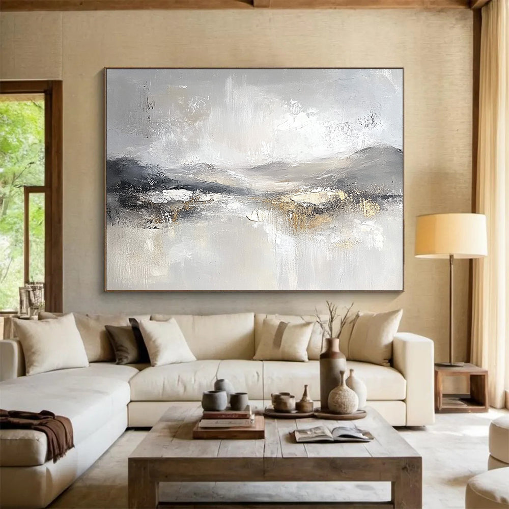 Large abstract painting featuring soft gray and white tones with subtle textures of snow-covered hills and ethereal clouds for a calming atmosphere.SC083