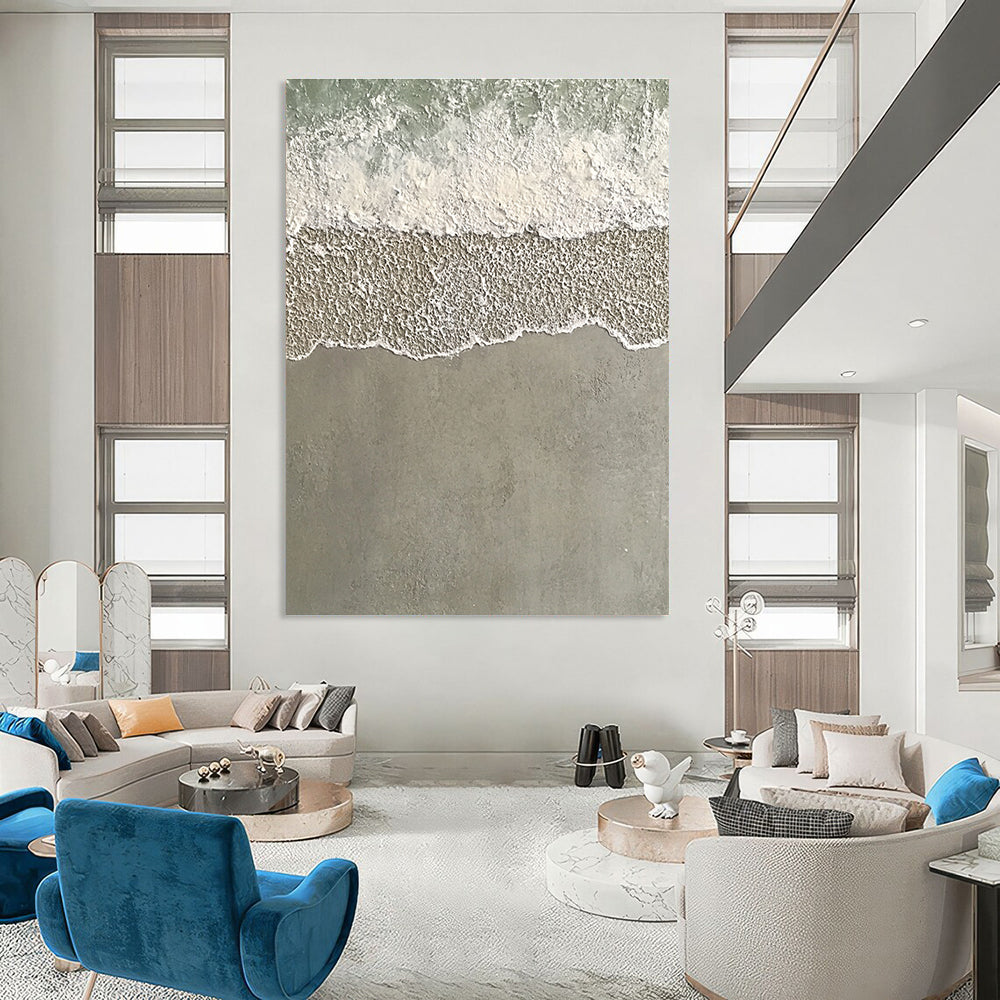 Large abstract painting depicting serene water and sand with textured wave patterns in light green and grayish-white tones.STSC1136