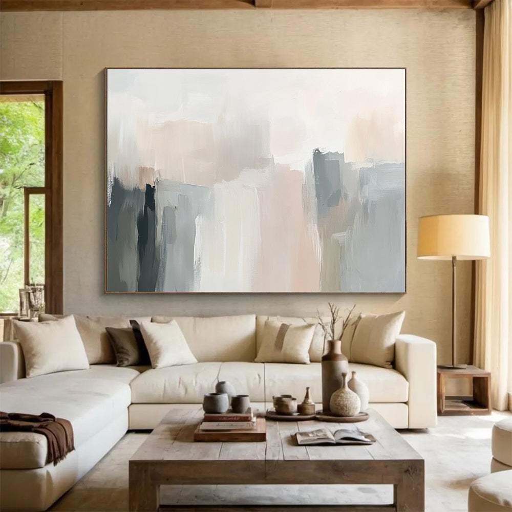 Large abstract painting in soft neutral tones with gentle brushstrokes and subtle color transitions creating an elegant atmosphere.SC058