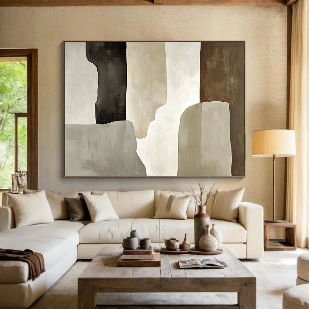 Large abstract painting featuring soft gray and beige tones with loose brush strokes and a prominent black shadow and tall monolithic shape.SC280