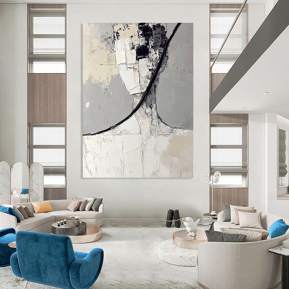 Large abstract painting in white and gray features black curved lines and layered irregular blocks creating a simple and clean composition.STSC383