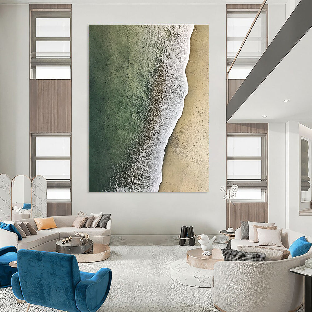 Large abstract painting of soft textured sand meeting green and white water from an aerial view, evoking serenity and natural beauty.STSC1159