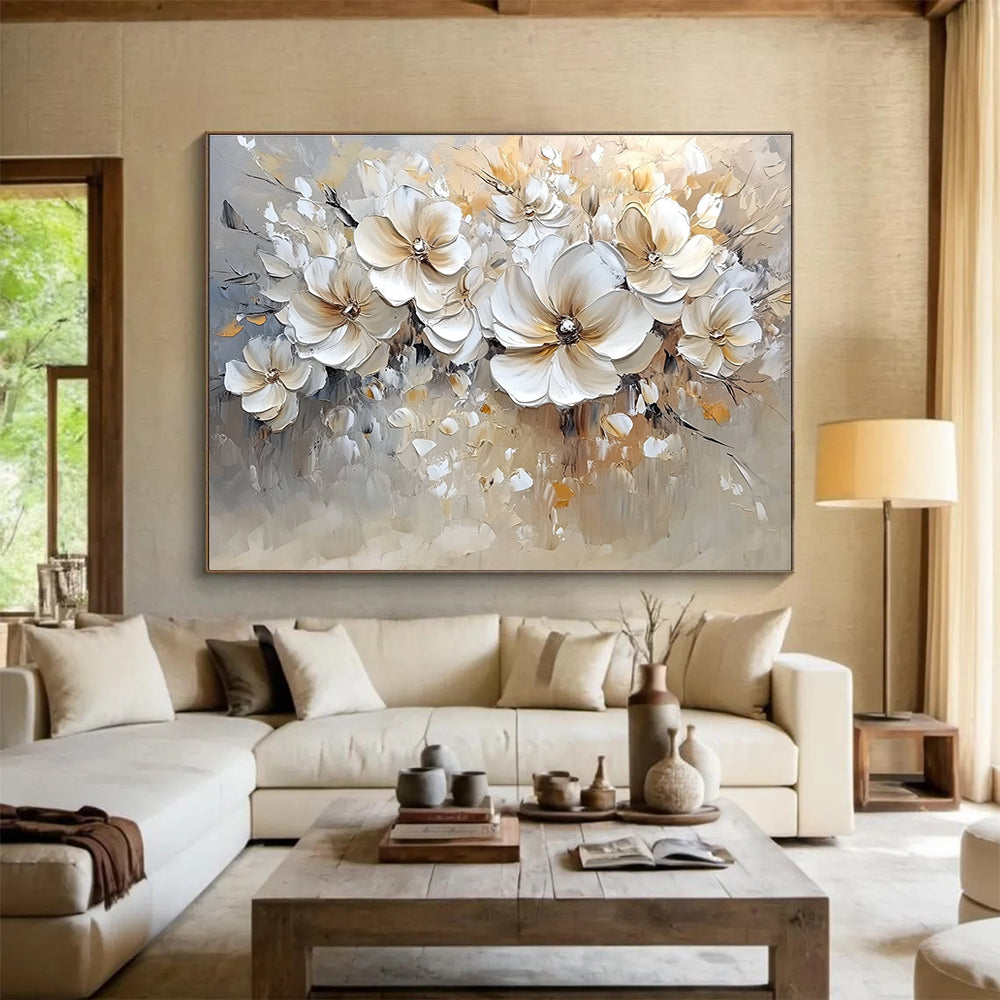 Large abstract painting featuring soft colors in white and beige with bold brush strokes and low detail of flowers.SC001