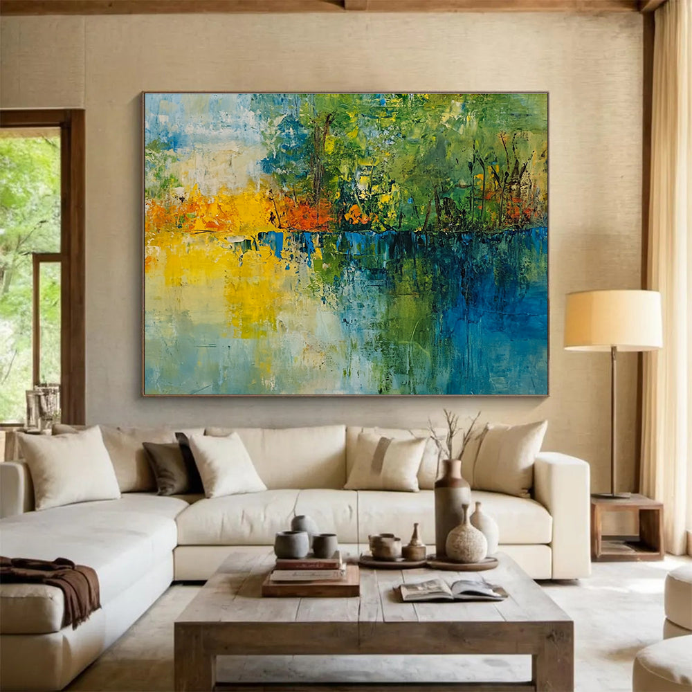 A large abstract painting featuring a vibrant landscape with trees a lake and a colorful sky perfect for home decor.SC519