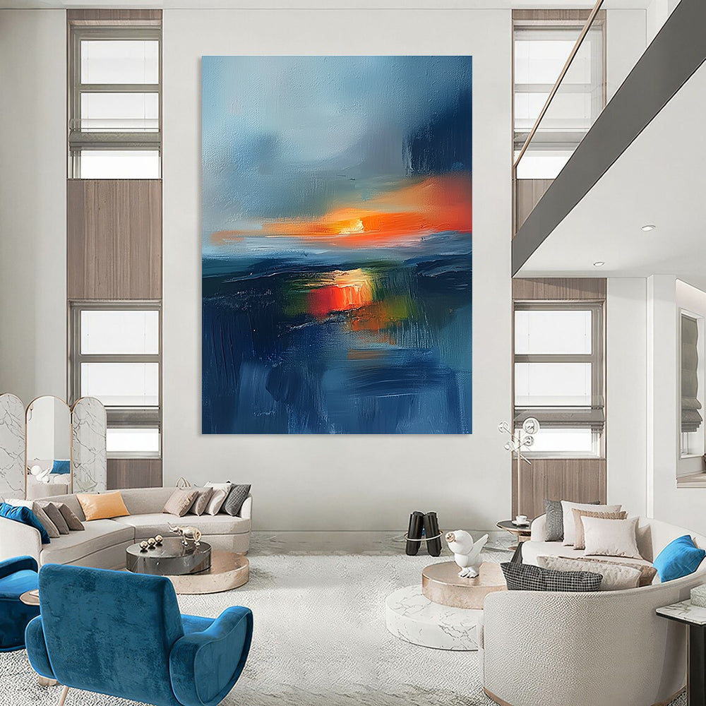 Large abstract painting featuring an Irish landscape at sunset with blue and orange tones and atmospheric clouds for a stunning visual impact.STSC149
