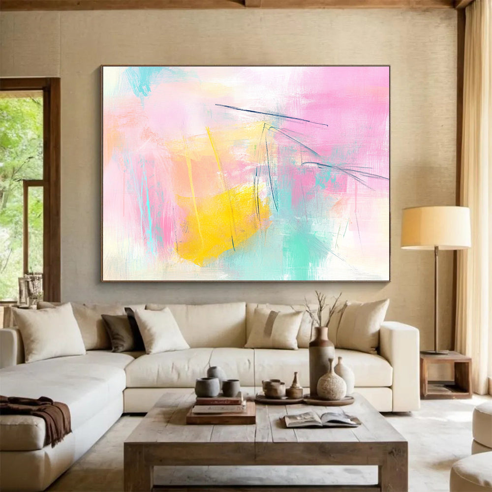 Large abstract painting featuring pink and yellow tones light blue lines and soft shapes creating a dreamy atmosphere with delicate brushstrokes and pastel background.SC211