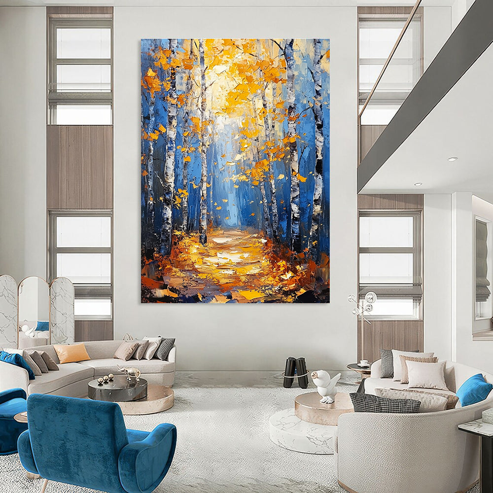 Large abstract painting of birch trees in autumn featuring blue and gold tones with textured background and tranquil atmosphere of sunlight filtering through branches.STSC870