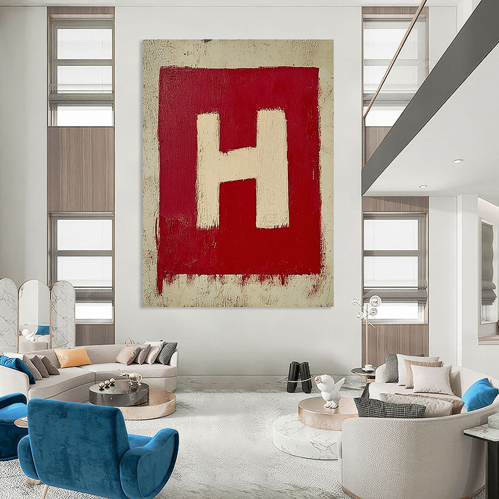 A large abstract painting featuring a minimalistic red and white letter H on textured canvas, showcasing simple brush strokes in oil paint.STSC1163