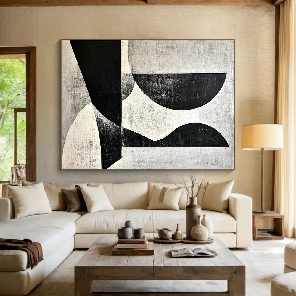 A large abstract painting featuring black and white shapes on a gray background inspired by Wim de Vries artistic style.SC506