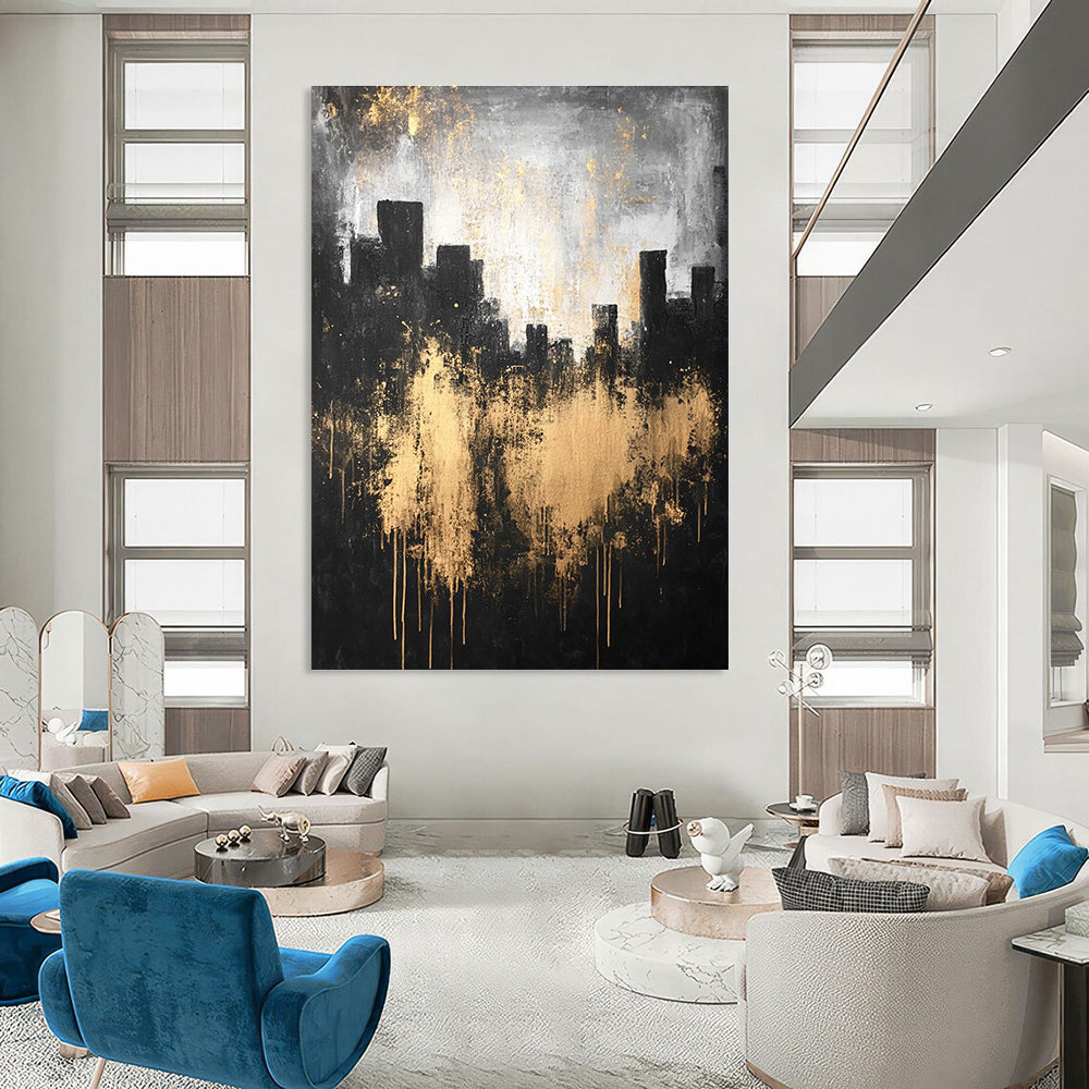 Large abstract painting featuring a city silhouette in dark gray and light gold with textured canvas and atmospheric lighting.STSC216
