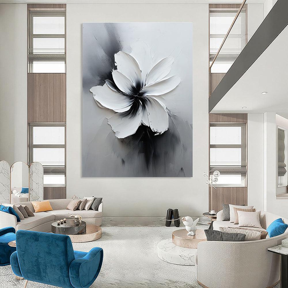 Large abstract white flower painting in black and gray with soft lighting and delicate textures creates an elegant minimalist art piece.STSC516