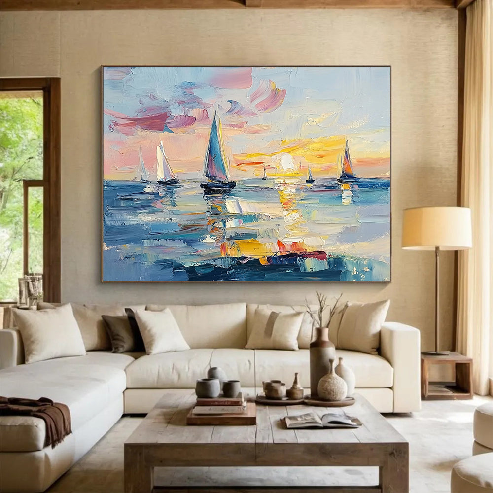 Large abstract painting of the ocean at sunset featuring sailboats vibrant pinks blues and yellows with expressive brush strokes and palette knife textures.SC606