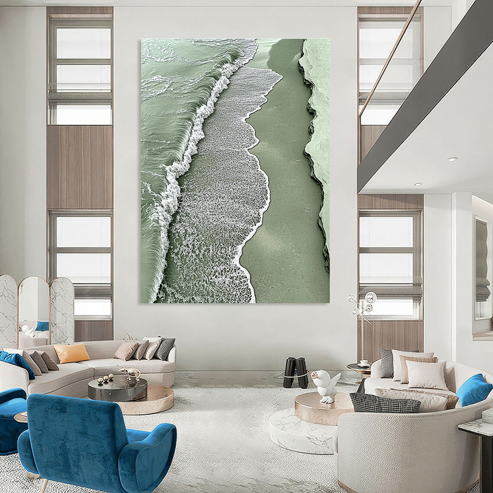 A large abstract painting featuring a light green sea with white foam and sandy waves evokes tranquility and nature's beauty.STSC533