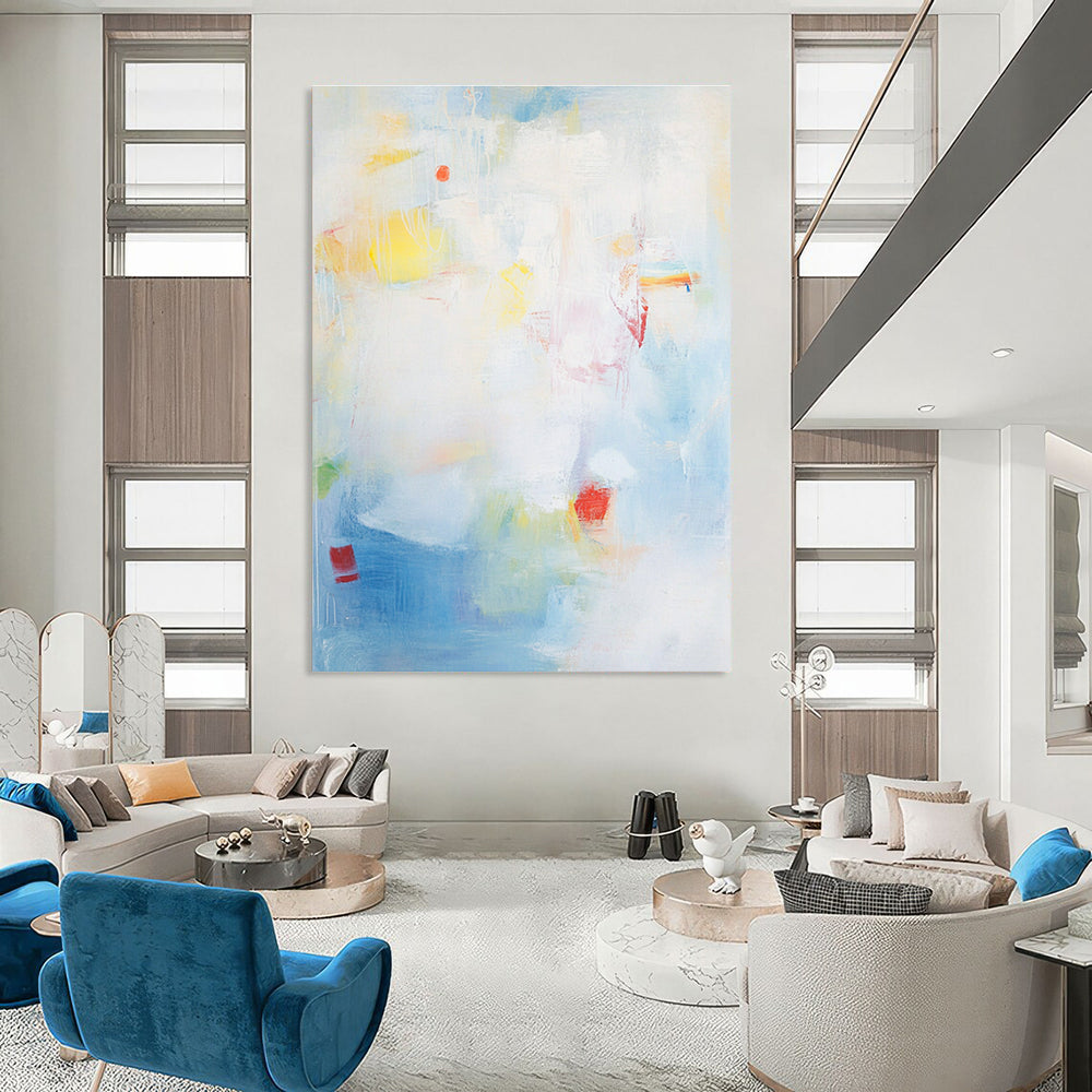 Large abstract painting with a light blue background and soft strokes depicting the sea with waves rocks and fishing boats.STSC401