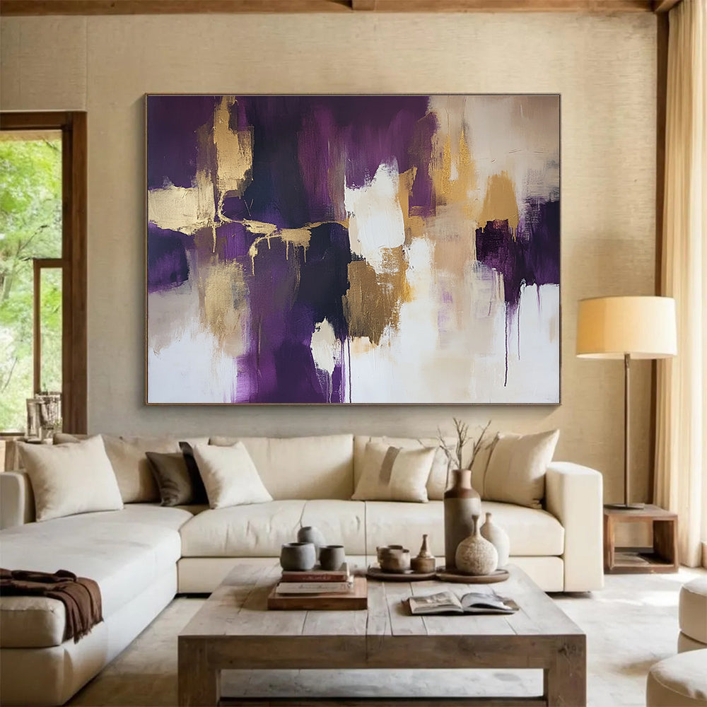 Large abstract painting with gold leaf highlights in shades of purple and beige accented by soft white edges creating a stunning composition.SC237