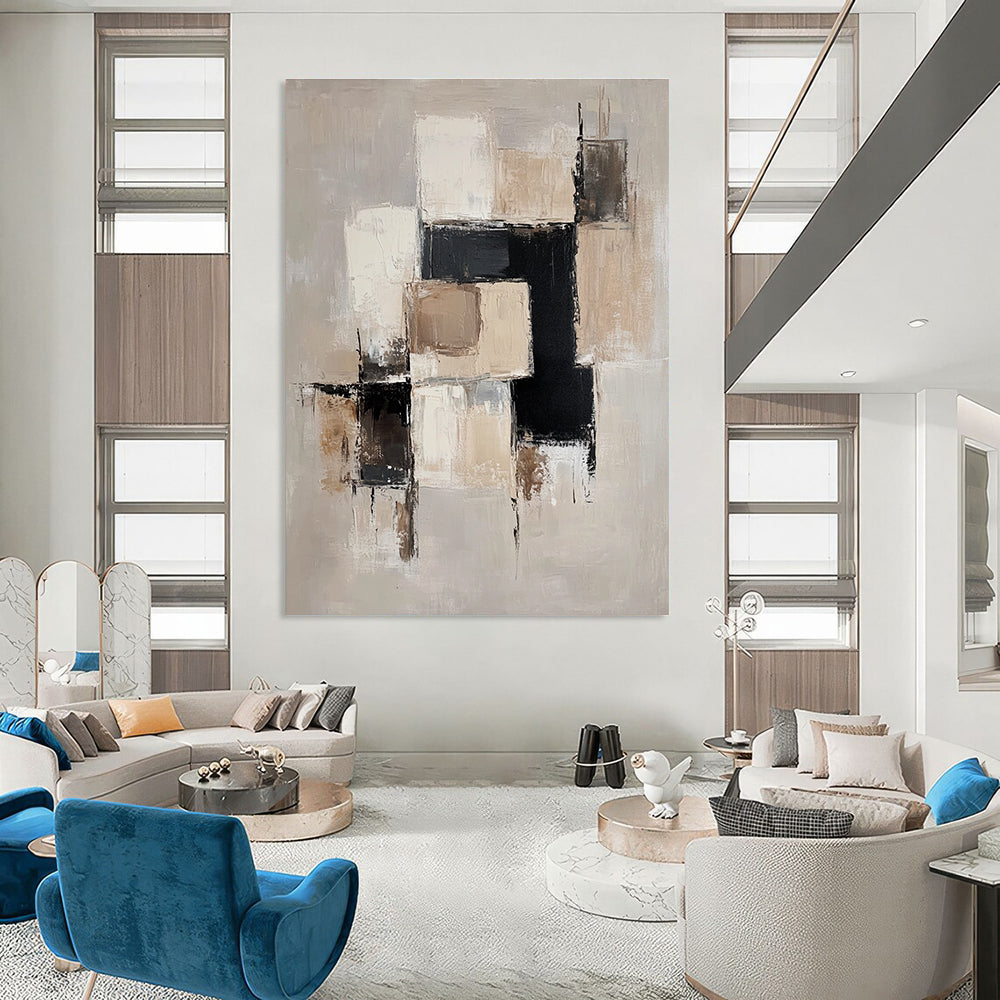 Large abstract painting with beige and white blocks black accents and soft edges on a light gray background creating an elegant minimalist feel.STSC220