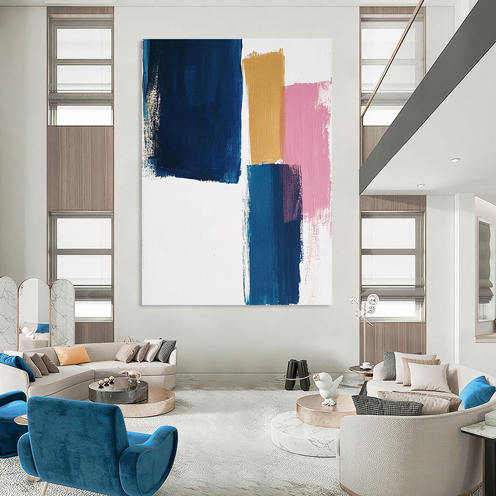 Large abstract painting featuring thick brush strokes on a white background with blocks of blue mustard and pastel pink colors.STSC1343