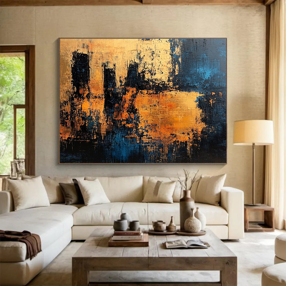 Large abstract painting with textured surface in dark blue and gold suggesting an ancient castle wall radiating warmth and history.SC371