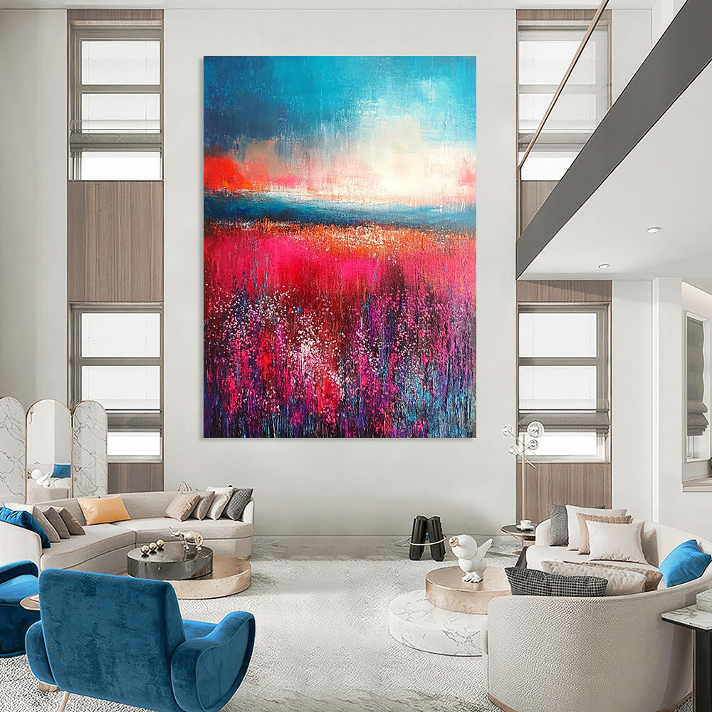 Large abstract painting with thick brush strokes in reds and pinks featuring an aqua blue sky and a detailed field of flowers.STSC117