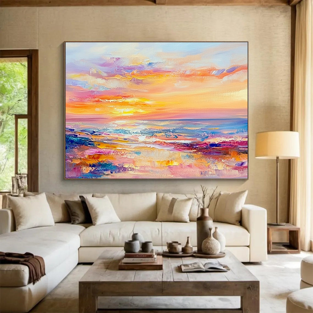 A large abstract painting of the sea at sunset in pastel colors with soft brushstrokes evokes calmness and tranquility.SC416
