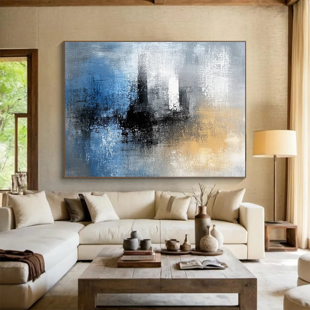 Abstract painting featuring blue black and white textures with gray yellow and brown hues complemented by a tower silhouette in the background.SC032