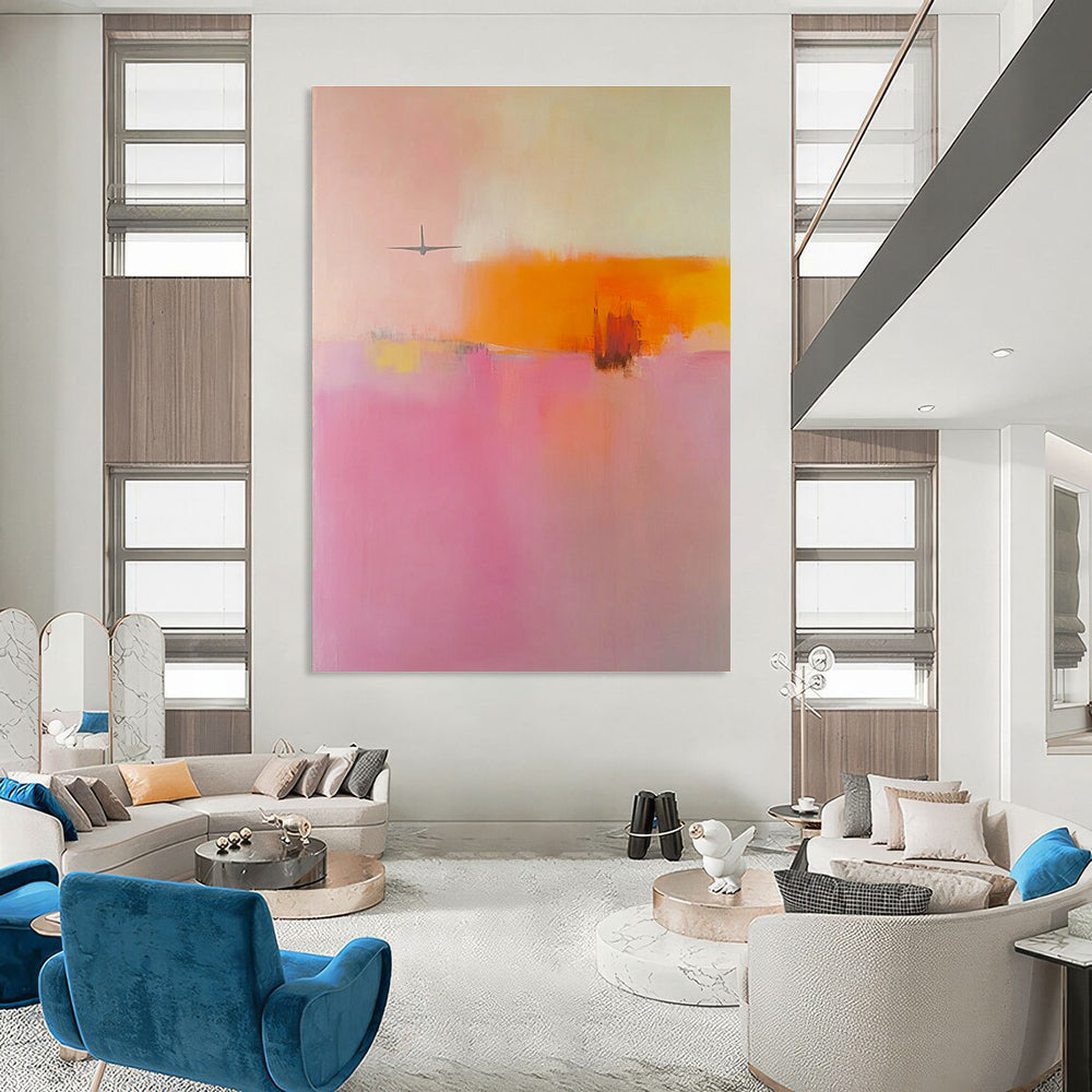 Large abstract painting in soft pink orange and yellow tones featuring blurred edges and an airplane shape in a minimalist style.STSC789