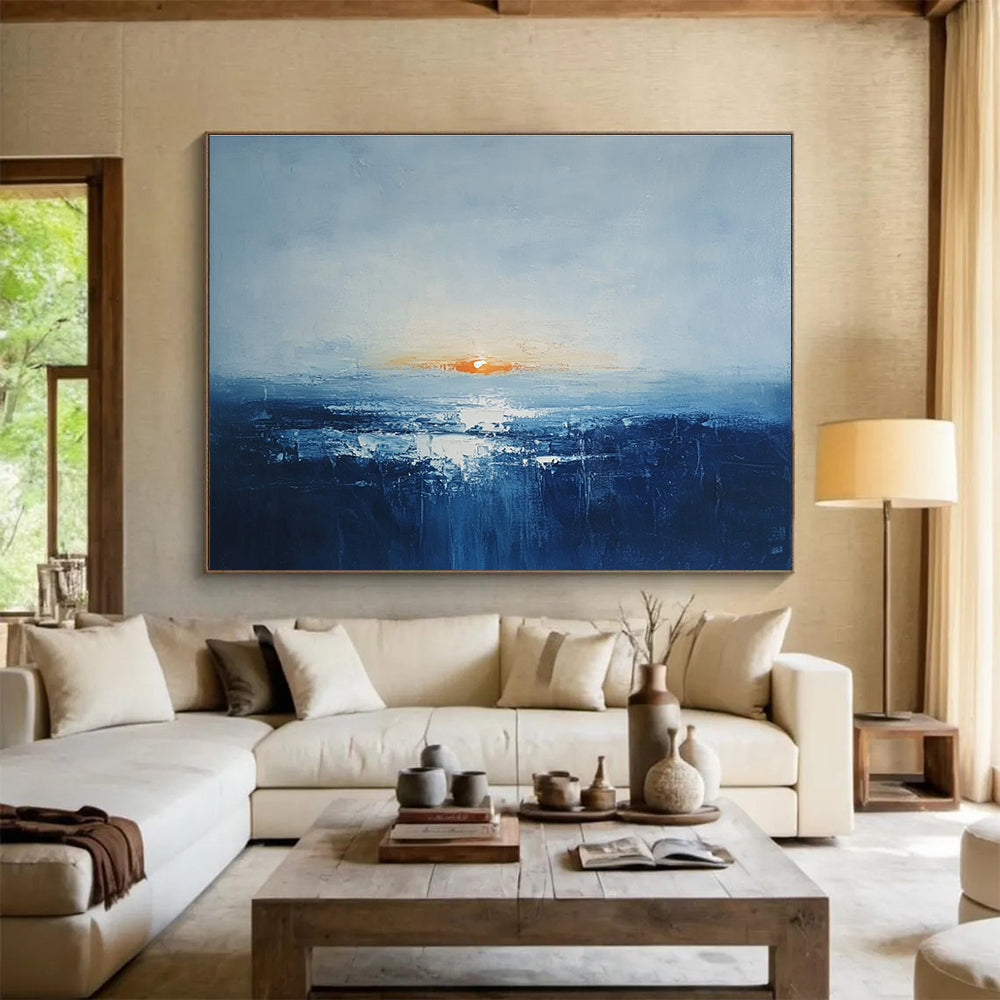 Abstract oil painting of an Irish landscape at sunrise featuring muted colors dark blue sea and an orange sun peeking over a grey skySC106