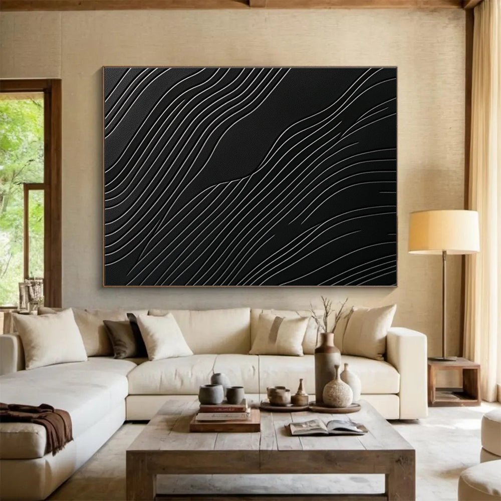 A large abstract artwork featuring elegant wave patterns on a matte black surface, showcasing layered textures and high contrast between light and dark tones.SC575