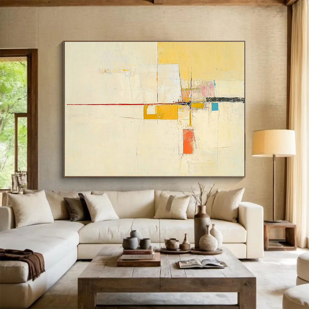 Large abstract painting featuring yellow beige colors thin red line off-white background small blue square soft orange lines geometric shapes and ample white space.SC332