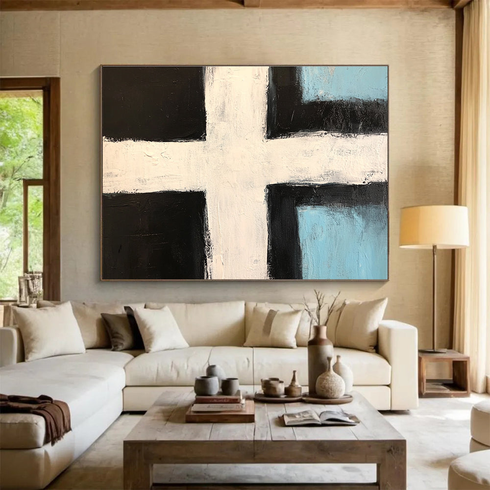 Abstract painting featuring a bold black and white cross with light blue accents and thick brush strokes in a minimalistic style.SC168