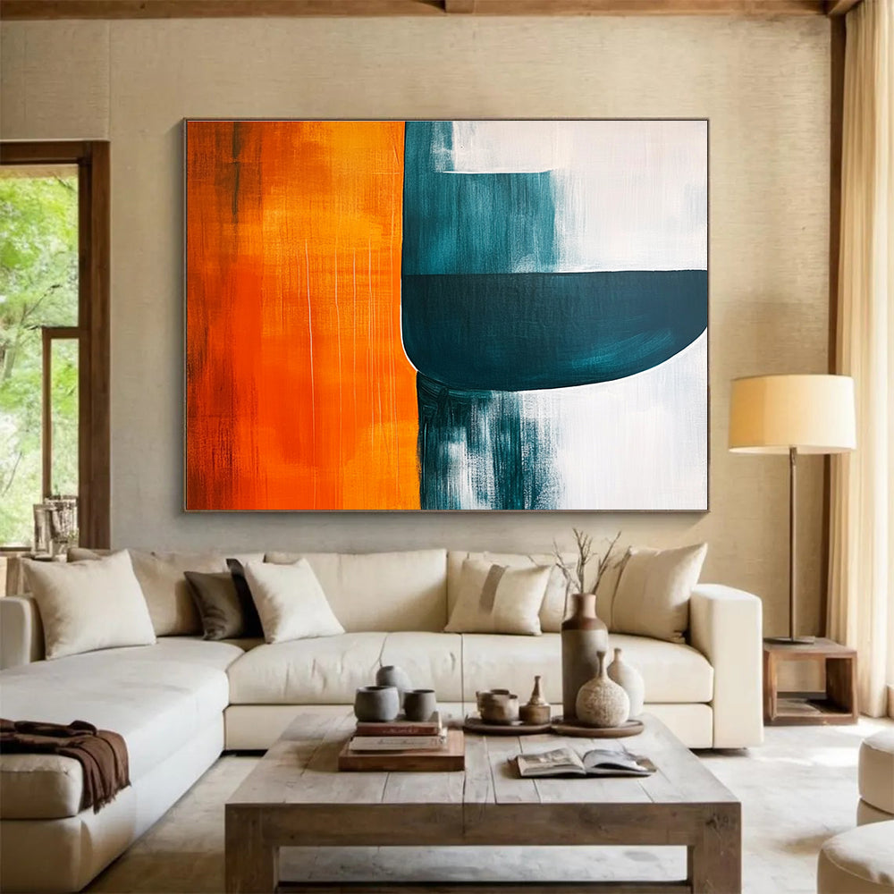 Large abstract painting featuring orange teal and grey shapes on a white background with negative space enhancing visual depth and minimalist style.SC249