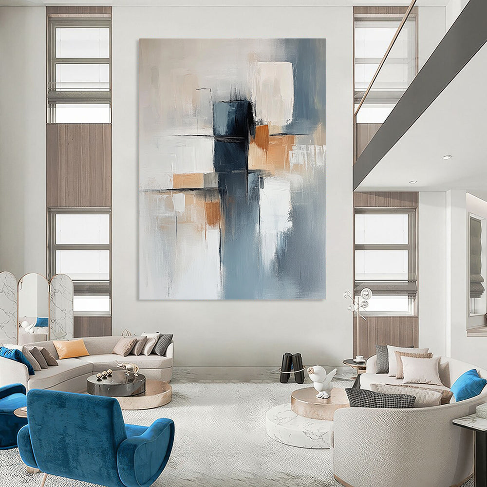 Large abstract painting featuring a light blue and gray background with soft lines and elegant white shapes complemented by dark blocks and warm accents.STSC400