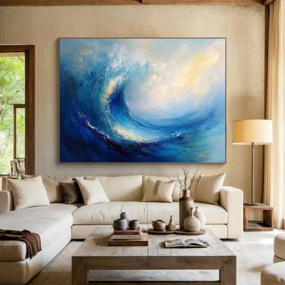 Large abstract oil painting of an ocean wave featuring blue and teal colors with thick brush strokes and white clouds in the background.SC108