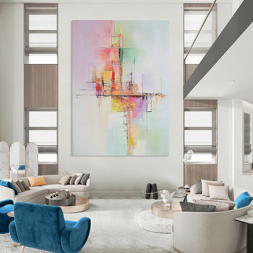 Large abstract painting with soft pastel colors depicting abstract buildings conveying calmness and dynamic balance enhanced by warm tones and textures.STSC803