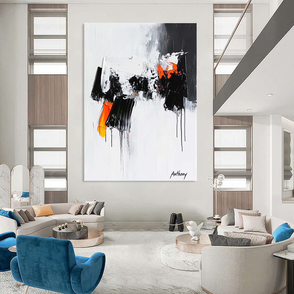 Large abstract painting featuring the word Anthony with black and orange dripping paint thick brush strokes and bold black shapes on a white background.STSC350