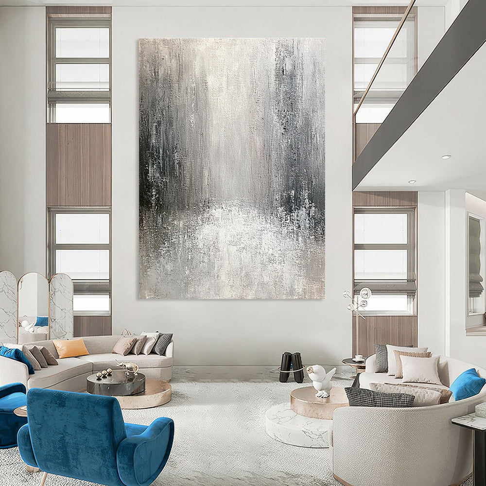 Large abstract painting of an old city featuring textured canvas in neutral tones with gray and white and silver accents creating an atmospheric perspective.STSC267