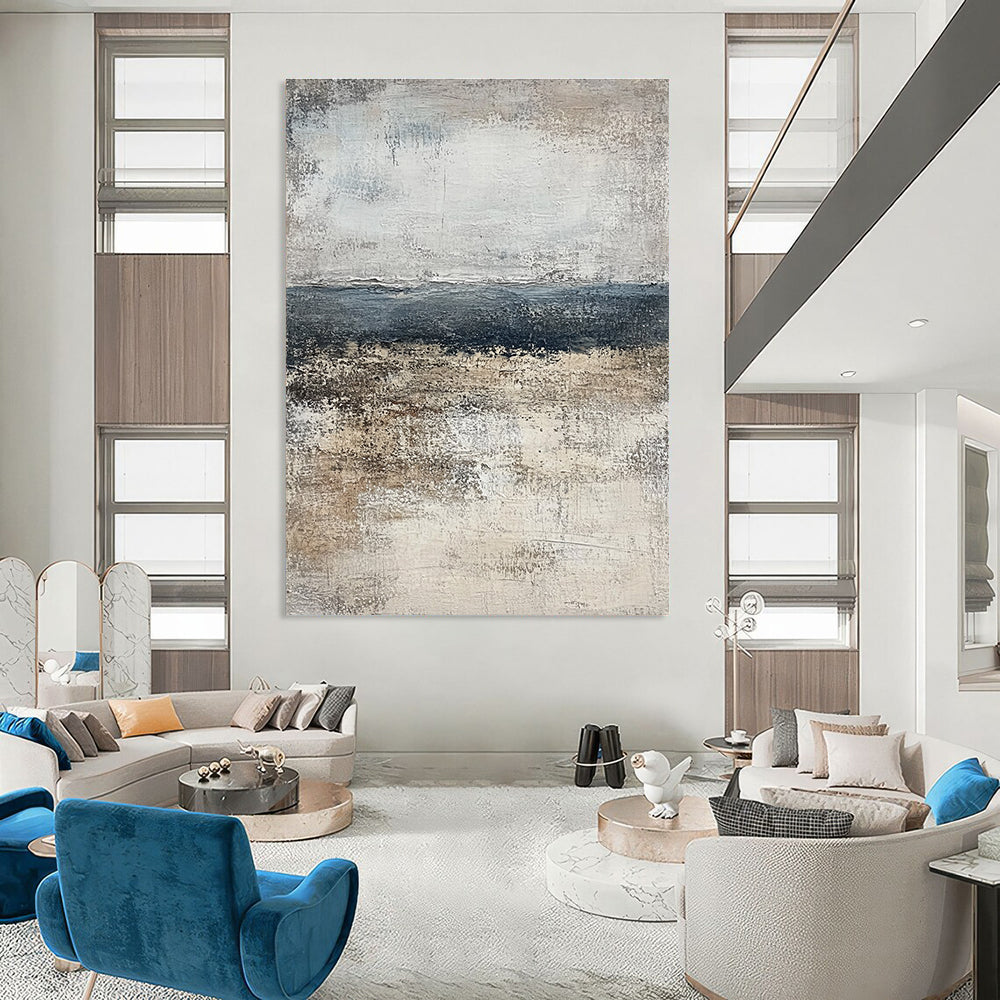 Large abstract painting of the ocean in muted gray and beige tones, featuring a calming neutral color palette that enhances any space.STSC491