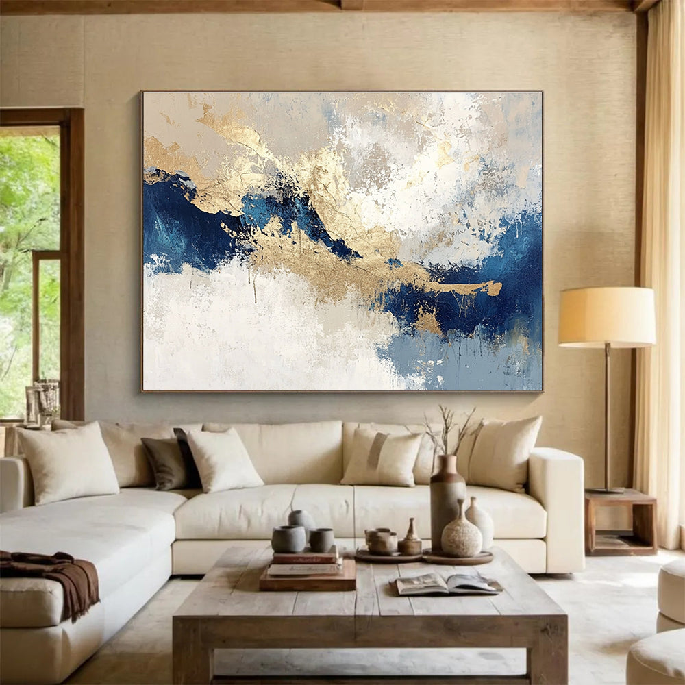 Large abstract painting in blue and gold on textured beige and white background featuring light gray and dark indigo tones for a stunning decor.SC023