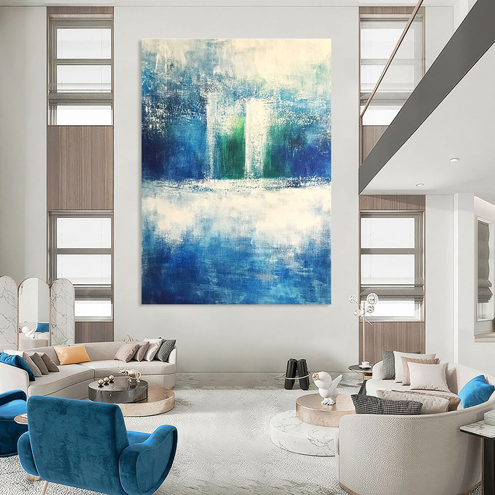 Large abstract painting evoking serene nature with shades of blue green gray and white featuring dynamic brushstrokes of rolling hills and waves.STSC368