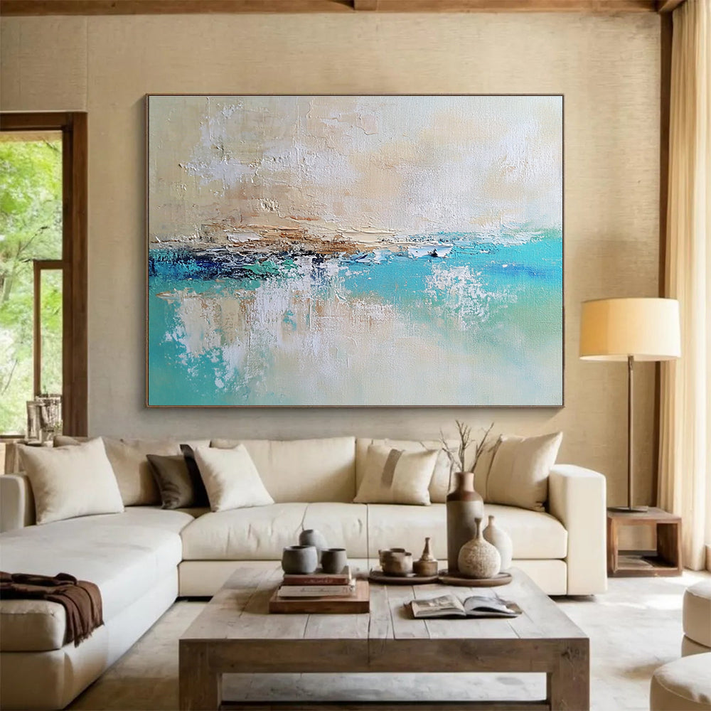 Large abstract painting of a calm sea featuring blue and green tones on a textured canvas with soft edges and neutral colors.SC340