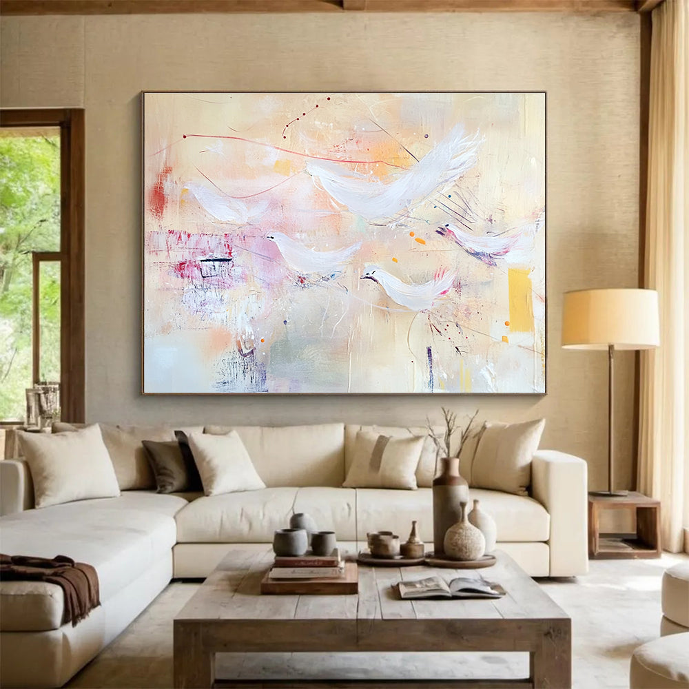 Large abstract painting with soft pastels featuring flying birds and textured layers evoking freedom and movement against a warm beige background.SC385