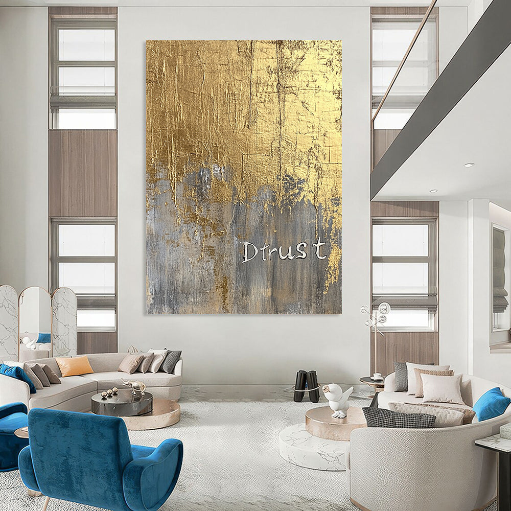 A large abstract painting featuring a gold foil background and textured silver lettering of Dtrust with elegant luxury and depth.STSC1003