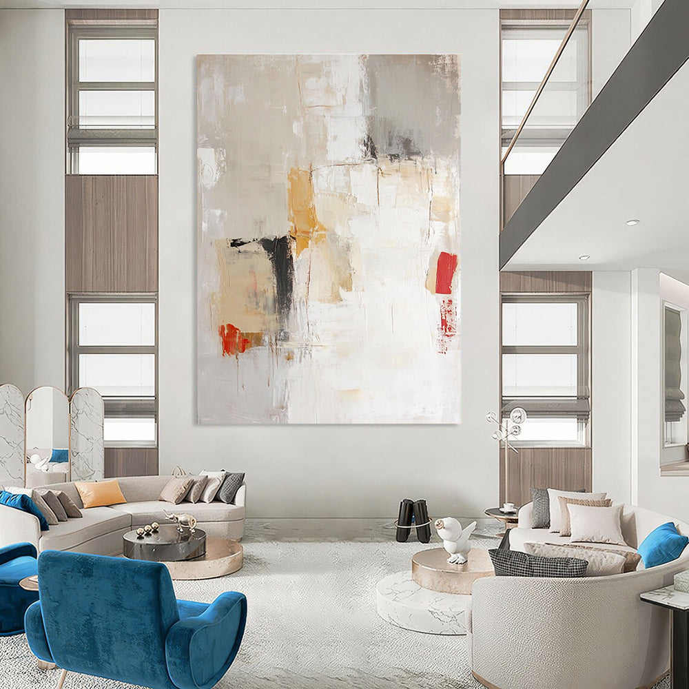 Large abstract painting in soft neutral tones of beige and white with expressive brushstrokes and hints of red and yellow.STSC801