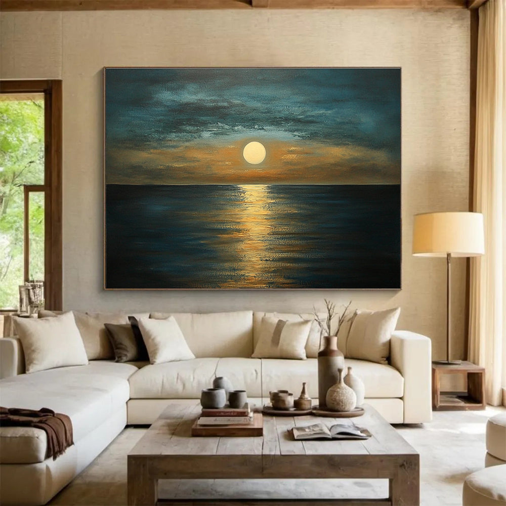 A large abstract painting depicting a serene sea at dusk with muted tones of blue brown and gold capturing tranquility and harmony in nature.SC413
