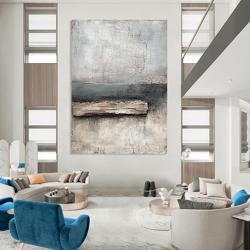Abstract painting featuring neutral tones of gray and white with textured canvas and thick paint highlighting a small piece of old wood by the water's edge.STSC138