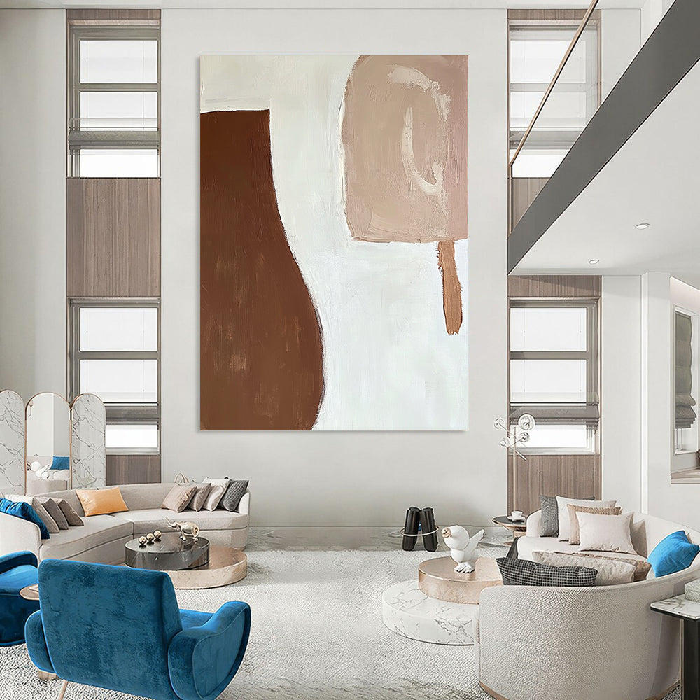 Large abstract painting featuring organic brown and white shapes with fluid brush strokes creating a calm serene atmosphere against a plain white background.STSC694