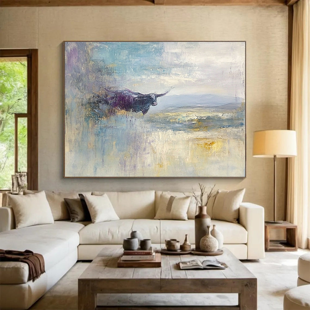 Large abstract painting depicting a flying cow over the English Lake District with a vast sky in shades of blue grey lavender cream and pale yellow.SC485