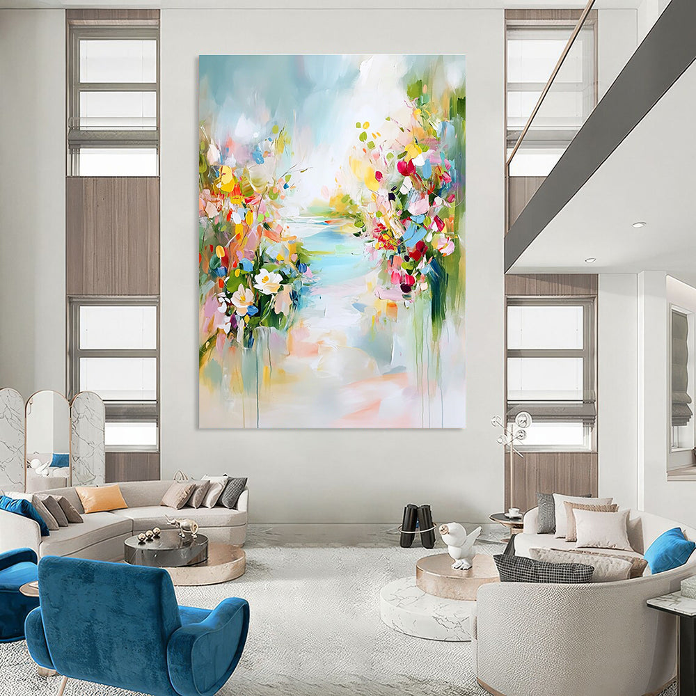 A large abstract painting depicting a tranquil spring landscape with colorful flowers soft skies and hints of blue water.STSC891