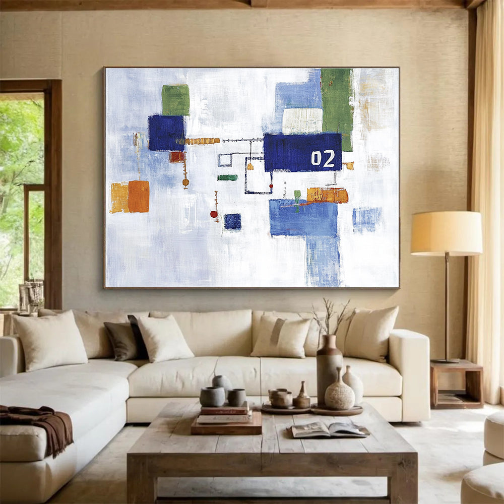 Large abstract painting featuring a white sky and blue and green cityscape with simple shapes and the number 02 at the center.SC182